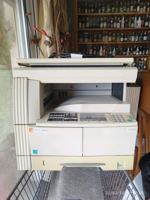Triumph Adler DC2216 black and white printer used with table