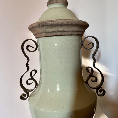 Ceramic decorative vase like new with iron handles