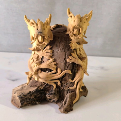 Wooden carved dragons used on wooden base