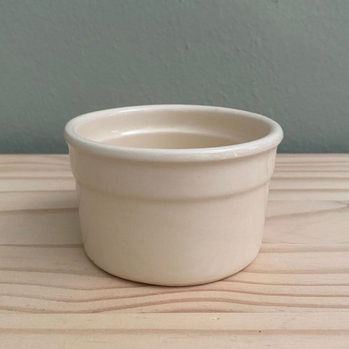 Small beige ceramic bowl used