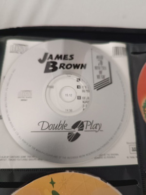 Set of 4 CDs and DVD used, James Brown, Garfield, Christmas songs