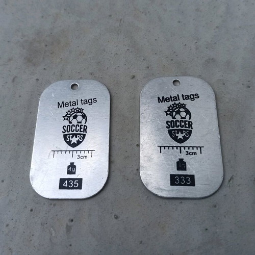 Metal football tags Podolski and Higuain like new