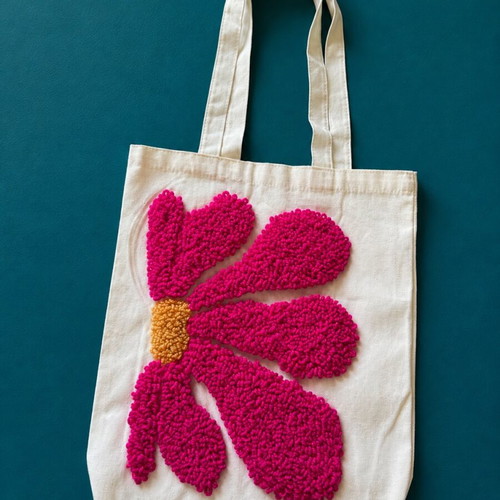 Handmade women's shoulder bag with flower design