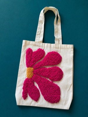 Handmade women's shoulder bag with flower design