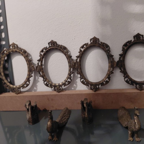 Vintage set of 4 baroque brass frames and 4 brass peacock decorations used