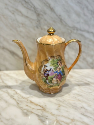 Vintage German Porcelain Teapot with Romantic Scene and Gold Details like new