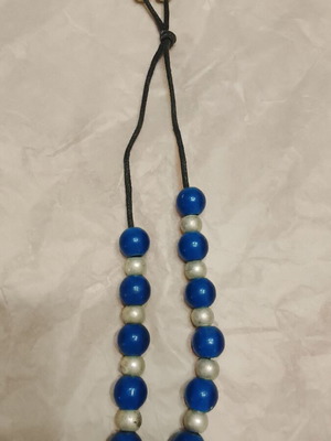Worry beads used with white and blue beads