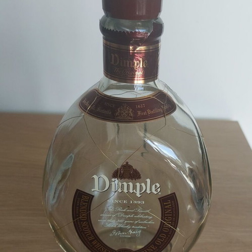 DIMPLE 15 years bottle