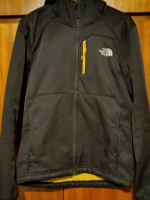 The North Face jacket used, size S, black and yellow