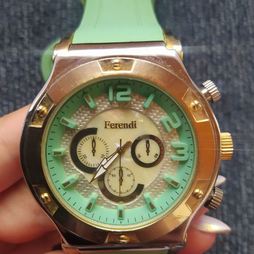 Ferendi women's wristwatch used, turquoise color