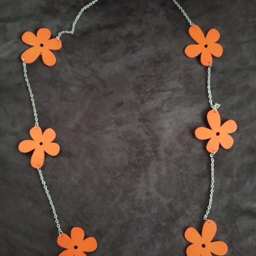 Long necklace with orange wooden daisies and silver chain like new
