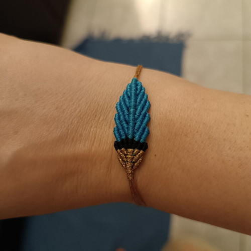 Macrame feather bracelet with adjustable clasp