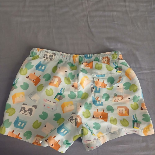 Minecraft swim shorts and Spiderman hooded towel, Zara