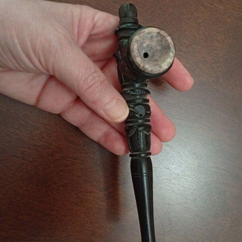 Handmade carved wooden pipe with stone inlay