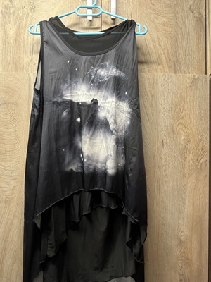 Two-piece tunic new with sheer bottom and unique effect