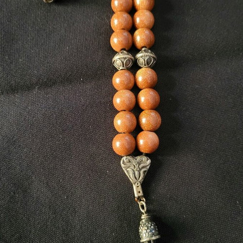 Komboloi made of goldstone and 925 silver like new