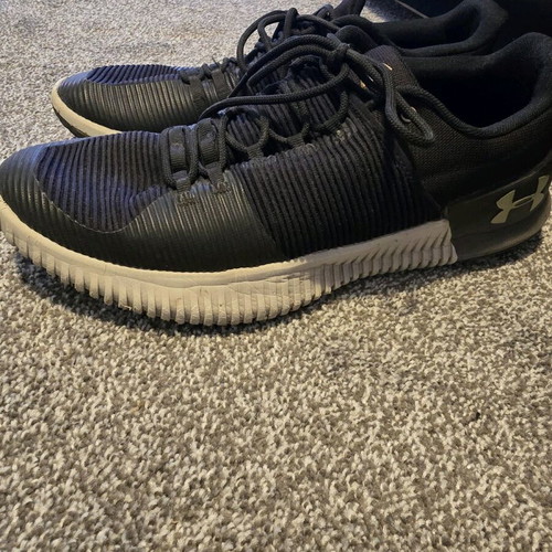 Under Armour men's athletic shoes used, size 45, black