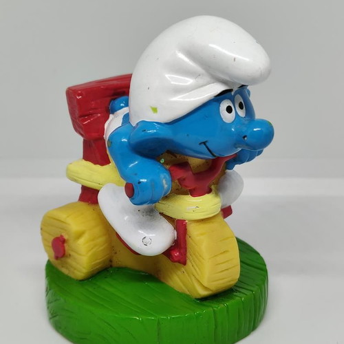 Smurf collectible figure on bicycle handmade Peyo like new
