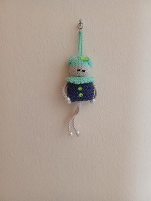 Knitted doll handmade, new