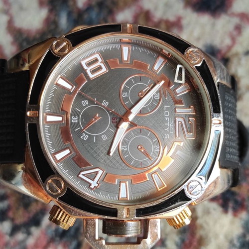 Loftys women's analog wristwatch with rubber strap