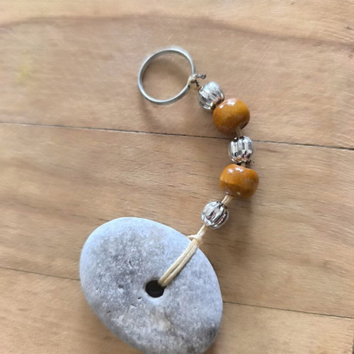 Handmade keychain with natural pebble and wooden beads