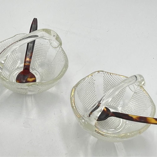 Two small glass baskets with spoon for caviar used