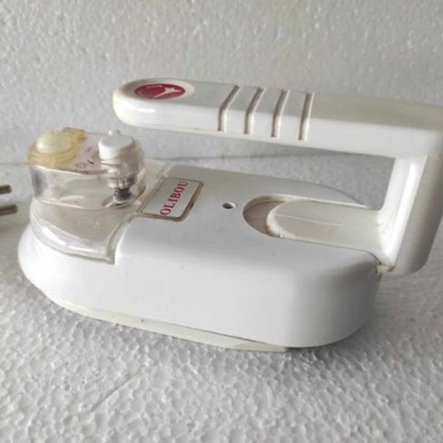 Mini travel iron like new with water and foldable design