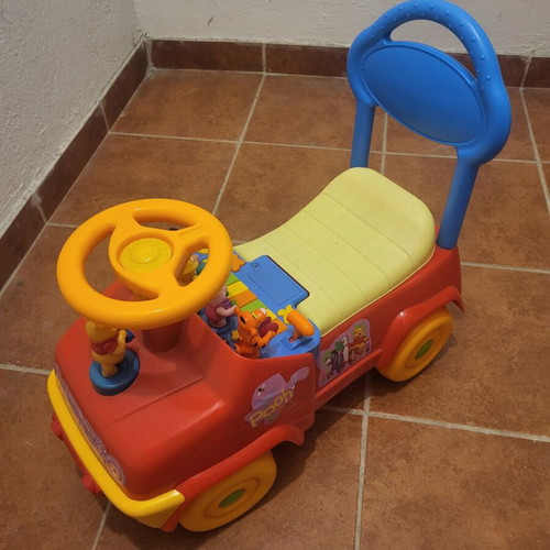 Winnie the Pooh ride-on car with sounds and storage