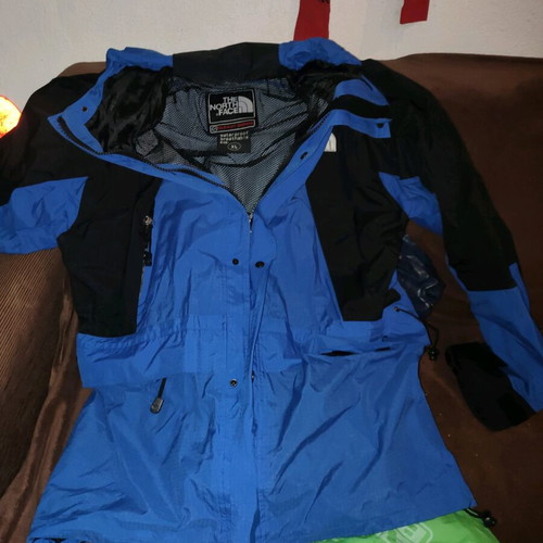 The North Face men's jacket used blue and black waterproof windbreaker