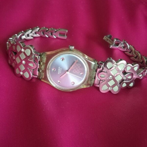Swatch women's wristwatch 2006 stainless steel like new, turquoise and silver