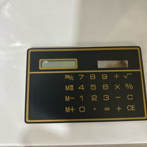 Ultra Thin Calculator with Touchscreen and Solar Power, Like New
