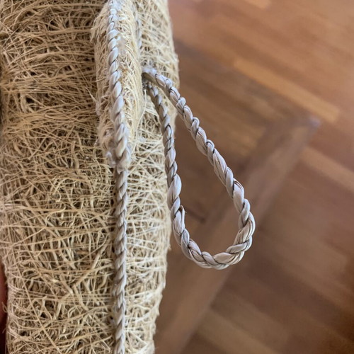 Handmade decorative dolphin made of grass