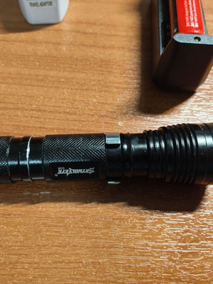 Rechargeable LED Flashlight with Charger, Adapter and Battery like new