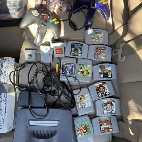 Nintendo 64 console with Expansion Pack, 2 Rumble Packs, 2 controllers, 9 games