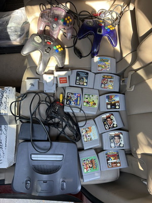 Nintendo 64 console with Expansion Pack, 2 Rumble Packs, 2 controllers, 9 games