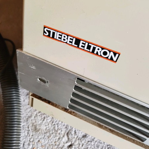 Heating body like new, white and clean