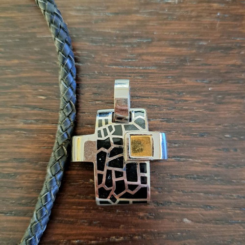 Impressive cross used with leather cord