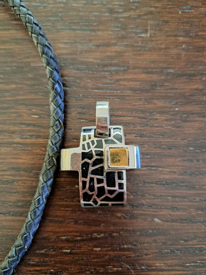 Impressive cross used with leather cord