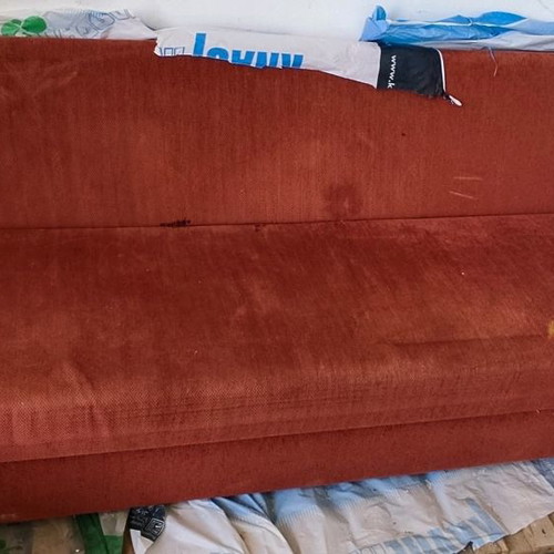 Three-seater sofa bed used with storage space