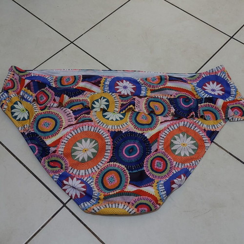 Women's floral bikini bottom Never Fully Dressed size 54 like new, multicolor