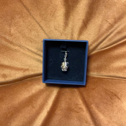 Swarovski lion charm like new, silver and gold
