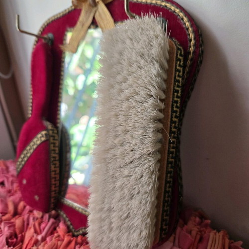 Antique mirror with velvet frame and doll, used 1950-1965