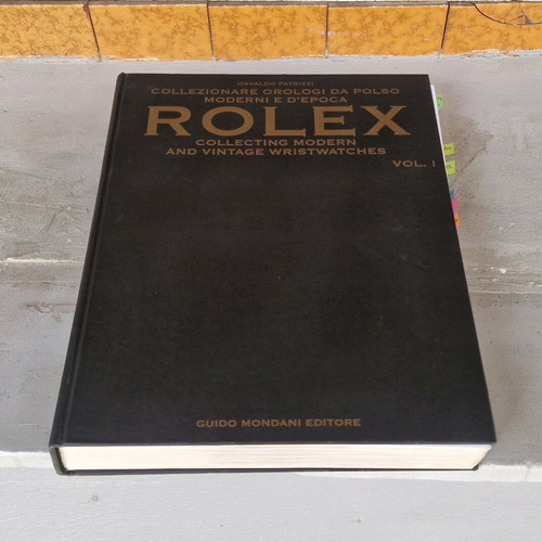 Rolex catalog large book like new in Italian and English