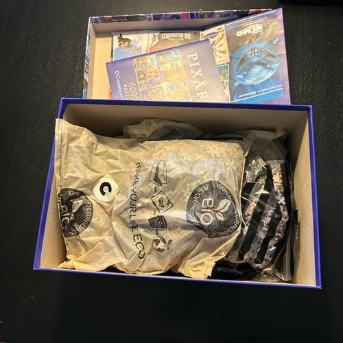 Pixar puzzle 6000 pieces used with one of four bags opened