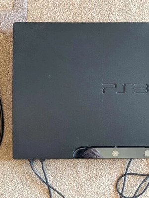 PlayStation 3 Slim used with 2 controllers and PES 2015 game