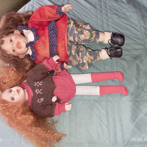 Porcelain dolls like new, 45 cm height