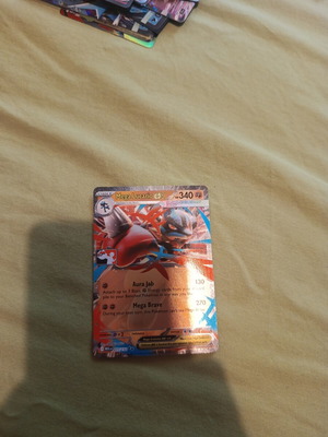 Mega Lucario stamped Pokemon card
