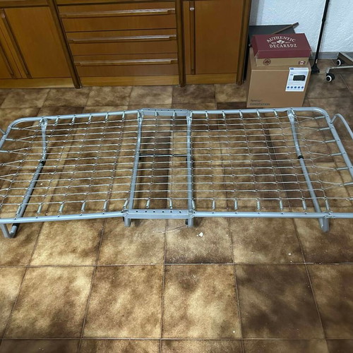 Folding bed cot like new with springs and metal frame