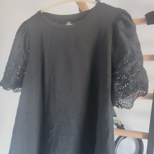 Black blouse with embroidered sleeves