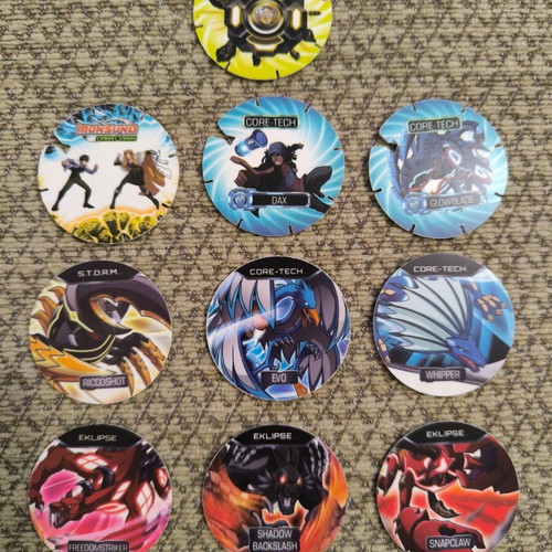 Transformers and Monsuno caps like new, pack of 28